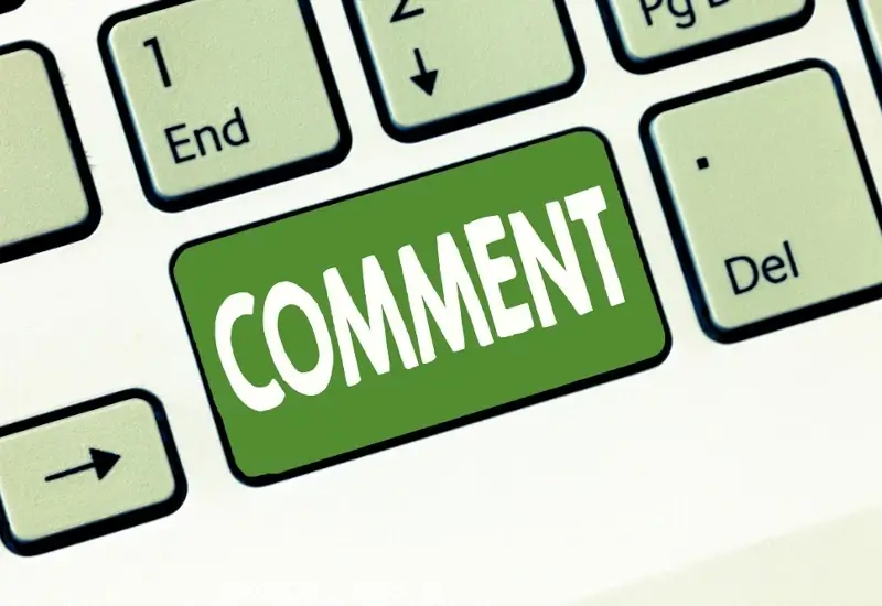 A drawing of a green keyboard with a "comment" button in all caps